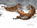 tigres sur le champ de neige